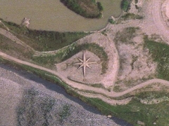 Rhoose sand sign : compass