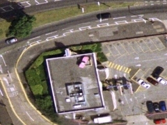 Pink Cadillac on roof (Transportation) - cache image