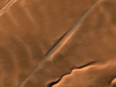 Road against sand (Human made)