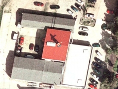Man on roof (Human made)
